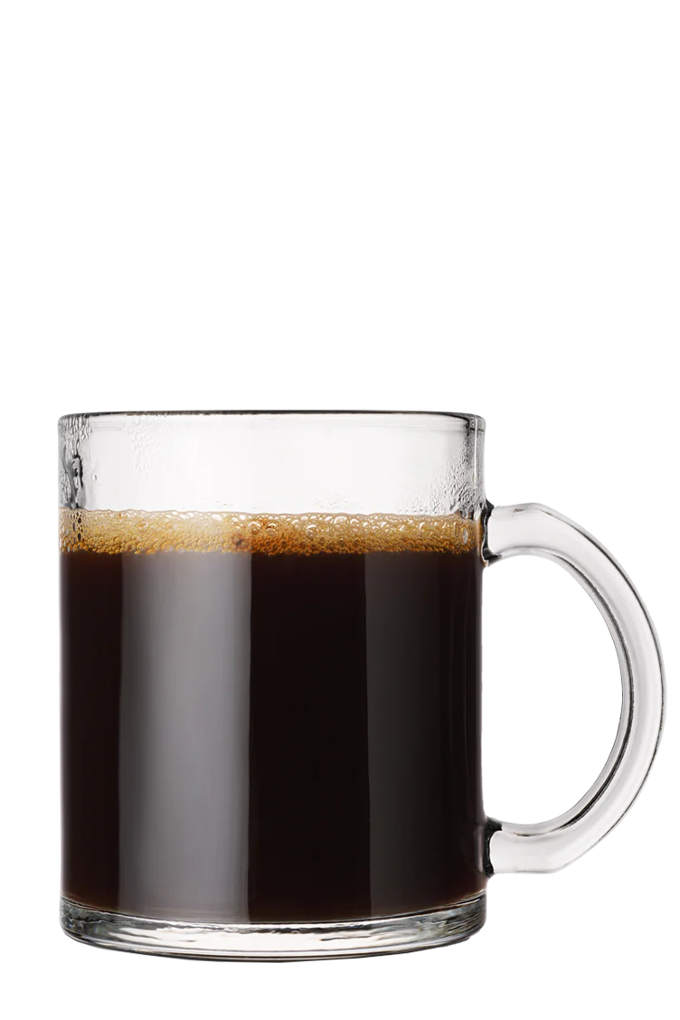 A glass mug filled with liquid on a black background