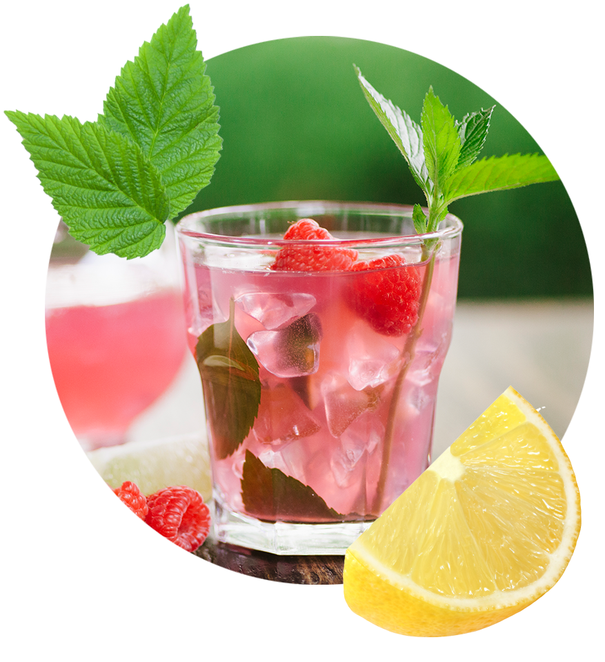 A refreshing glass of raspberry lemonade with a lemon slice