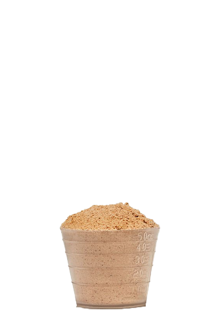 a small cup filled with sand on a black background