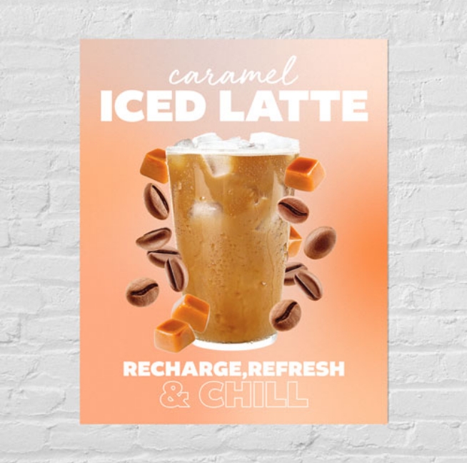A poster featuring an iced latte displayed on a brick wall